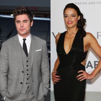 Zac Efron e Michelle Rodriguez trocam beijos durante passeio em iate